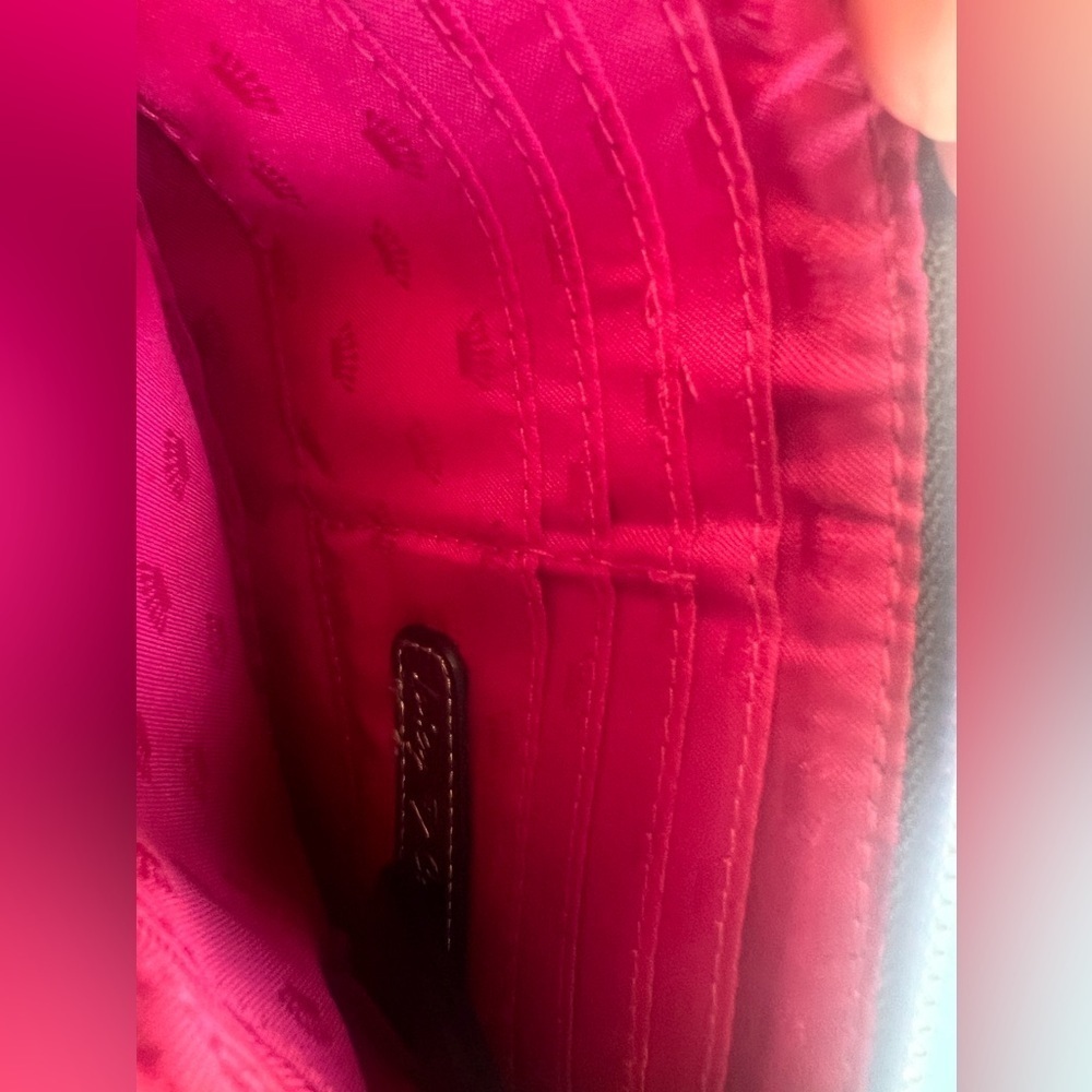 Juicy Couture Bronze iridescent Wristlet Clutch
Some wear - look closely - Picture 3 of 7